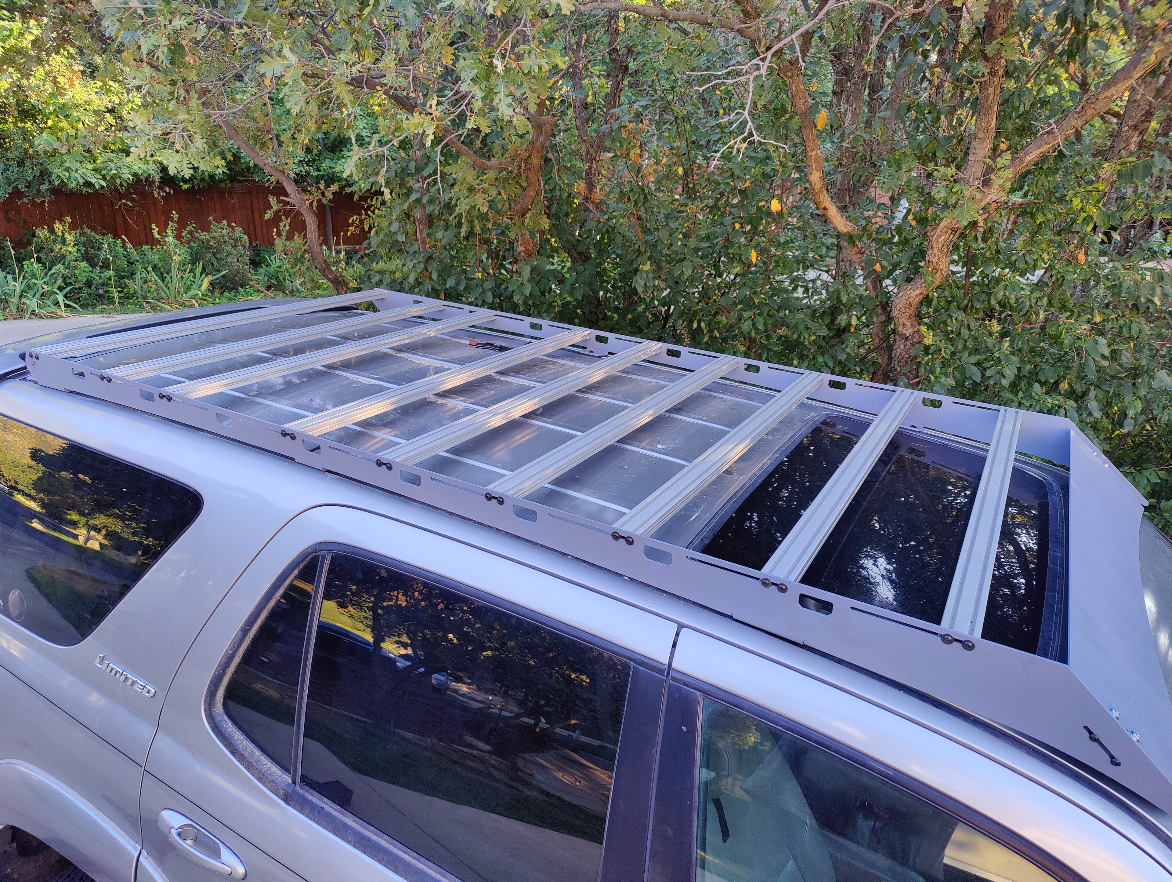 racklite industries sequoia roof rack installed on vehicle, grey with black hardware